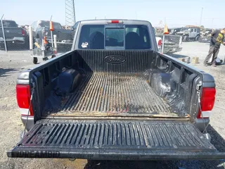 2000 Ford Ranger XLT with VIN 1FTZR15X9YPB33383, listed as a IAAI auction lot 41821934 with 176,899 mi miles and . Bid and sale history available at DreamBid. Image 8.