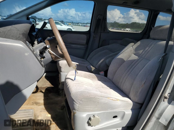 1999 Toyota Sienna CE with VIN 4T3ZF19CXXU159400, listed as a Copart auction lot 72435024 with 281,279 mi miles and Salvage Title. Bid and sale history available at carsss.com. Image 7.