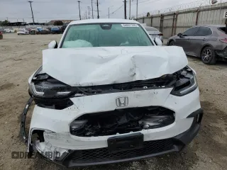 2023 Honda HR-V LX with VIN 3CZRZ1H37PM735335, listed as a Copart auction lot 58957705 with 21,203 mi miles and Salvage title. Bid and sale history available at DreamBid. Image 5.
