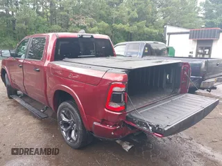 2023 Ram 1500 Limited with VIN 1C6SRFHM2PN509939, listed as a IAAI auction lot 42514018 with 31,669 mi miles and . Bid and sale history available at DreamBid. Image 3.
