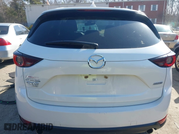 2017 Mazda CX-5 Touring z VIN JM3KFBCL8H0214052, wystawiony jako IAAI lot #41940783 z przebiegiem 120 083 mil mil oraz . Historia ofert i sprzedaży dostępna na DreamBid. Obrazek 15.