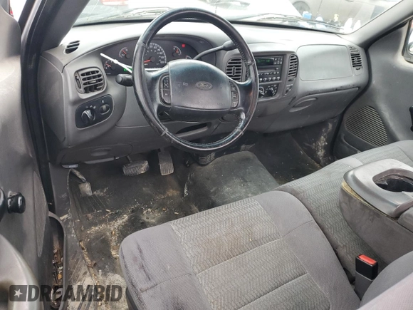 2002 Ford F-150 XL with VIN 1FTRF172X2NB77521, listed as a Copart auction lot 43993885 with 339,289 mi miles and Salvage Title. Bid and sale history available at carsss.com. Image 8.