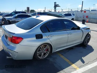 2014 BMW 3 Series 335i with VIN WBA3A9G59ENS64793, listed as a IAAI auction lot 41746865 with 93,899 mi miles. Bid and sale history available at carsss.com. Image 4.