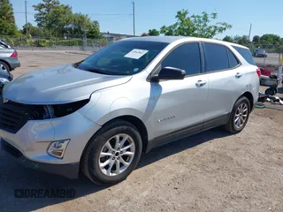 2018 Chevrolet Equinox LS with VIN 3GNAXHEV8JS502212, listed as a IAAI auction lot 42064863 with 107,321 mi miles and . Bid and sale history available at DreamBid. Image 2.