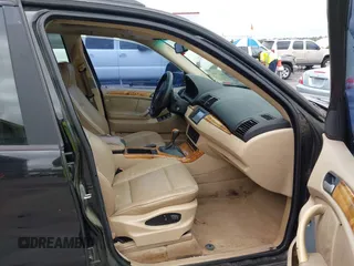 2003 BMW X5 3.0i with VIN 5UXFA53563LW26813, listed as a IAAI auction lot 41873041 with 188,523 mi miles. Bid and sale history available at carsss.com. Image 5.