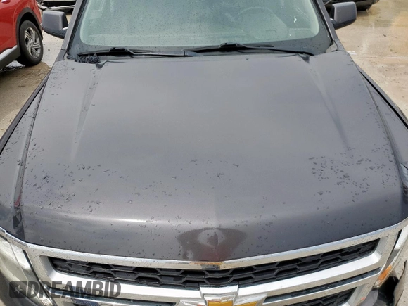 2015 Chevrolet Tahoe LS z VIN 1GNSCAKC4FR113247, wystawiony jako Copart lot #55578085 z przebiegiem 194 023 mil mil oraz Szkoda całkowita • Salvage title. Historia ofert i sprzedaży dostępna na DreamBid. Obrazek 12.
