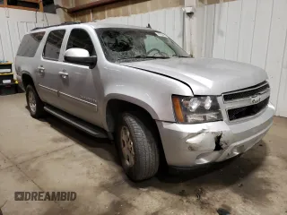2013 Chevrolet Suburban LS with VIN 1GNSKHE72DR263672, listed as a Copart auction lot 87855905 with 124,081 mi miles and Salvage Title. Bid and sale history available at carsss.com. Image 4.