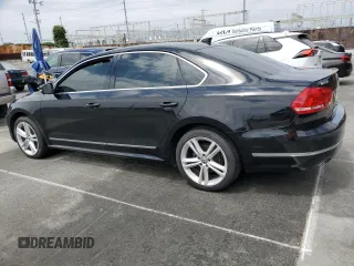 2014 Volkswagen Passat SEL Premium z VIN 1VWCN7A36EC077099, wystawiony jako Copart lot #58440905 z przebiegiem 144 462 mil mil oraz Szkoda całkowita • Salvage title. Historia ofert i sprzedaży dostępna na DreamBid. Obrazek 2.
