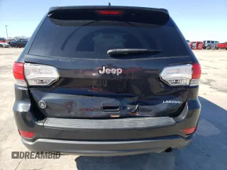 2014 Jeep Grand Cherokee Laredo with VIN 1C4RJEAGXEC217249, listed as a Copart auction lot 48585195 with 131,635 mi miles and Salvage Title. Bid and sale history available at DreamBid. Image 6.