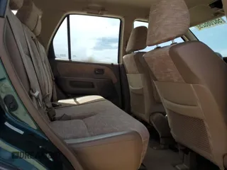 2003 Honda CR-V LX z VIN SHSRD68453U108196, wystawiony jako Copart lot #58206625 z przebiegiem 224 615 mil mil oraz Szkoda całkowita • Salvage title. Historia ofert i sprzedaży dostępna na DreamBid. Obrazek 11.