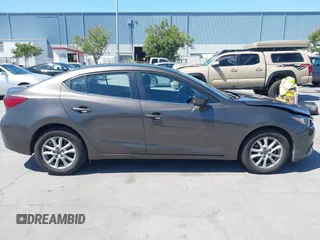2014 Mazda 3 i Touring z VIN JM1BM1V75E1113050, wystawiony jako IAAI lot #42374782 z przebiegiem 94 571 mil mil oraz . Historia ofert i sprzedaży dostępna na DreamBid. Obrazek 13.