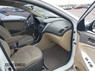 2014 Hyundai Accent GLS with VIN KMHCT4AE5EU649178, listed as a IAAI auction lot 41936729 with 102,737 mi miles. Bid and sale history available at carsss.com. Image 5.