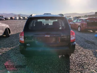 2009 Jeep Compass North with VIN 1J4FT47B89D189562, listed as a Copart auction lot 48285415 with 89,377 mi miles and Salvage Title. Bid and sale history available at carsss.com. Image 6.