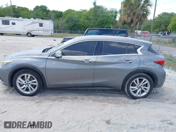 2018 Infiniti QX30 Premium z VIN SJKCH5CPXJA003377, wystawiony jako IAAI lot #41876556 z przebiegiem 91 673 mil mil oraz . Historia ofert i sprzedaży dostępna na DreamBid. Obrazek 14.