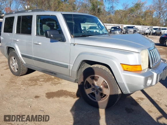 2007 Jeep Commander Sport z VIN 1J8HH48K77C587615, wystawiony jako IAAI lot #41149777 z przebiegiem 167 871 mil mil oraz . Historia ofert i sprzedaży dostępna na DreamBid. Obrazek 1.