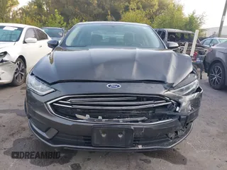2017 Ford Fusion S with VIN 3FA6P0G76HR121500, listed as a IAAI auction lot 40308024 with 130,325 mi miles. Bid and sale history available at carsss.com. Image 13.