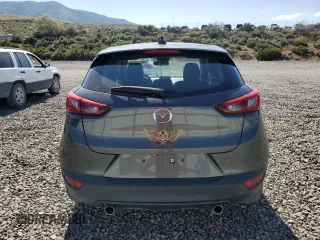 2019 Mazda CX-3 Touring z VIN JM1DKFC72K0430266, wystawiony jako Copart lot #59765545 z przebiegiem 77 534 mil mil oraz Szkoda całkowita • Salvage title. Historia ofert i sprzedaży dostępna na DreamBid. Obrazek 6.
