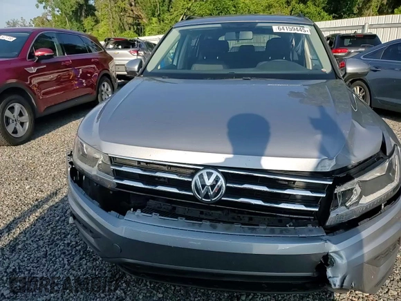 2021 Volkswagen Tiguan S with VIN 3VV1B7AX9MM023655, listed as a Copart auction lot 64159445 with 55,795 mi miles and Salvage title. Bid and sale history available at DreamBid. Image 13.