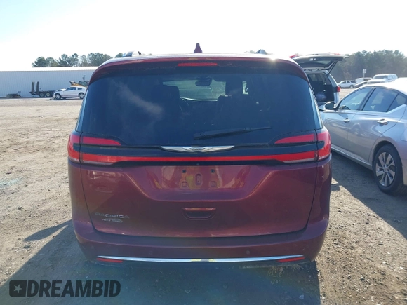 2021 Chrysler Pacifica Touring L z VIN 2C4RC1BG9MR588605, wystawiony jako IAAI lot #41830744 z przebiegiem 106 937 mil mil oraz . Historia ofert i sprzedaży dostępna na DreamBid. Obrazek 16.