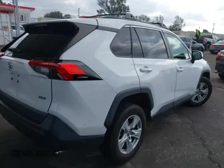 2019 Toyota RAV4 XLE with VIN 2T3W1RFV5KW051023, listed as a IAAI auction lot 40970612 with 106,359 mi miles and . Bid and sale history available at DreamBid. Image 4.