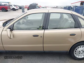 2002 Saturn LS z VIN 1G8JS54F02Y543678, wystawiony jako IAAI lot #42213978 z przebiegiem 132 755 mil mil oraz . Historia ofert i sprzedaży dostępna na DreamBid. Obrazek 14.