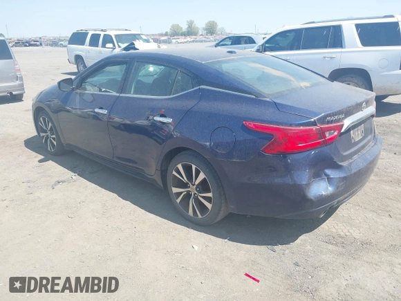 2016 Nissan Maxima SV z VIN 1N4AA6AP3GC386959, wystawiony jako IAAI lot #41886544 z przebiegiem 155 362 mil mil oraz . Historia ofert i sprzedaży dostępna na DreamBid. Obrazek 3.