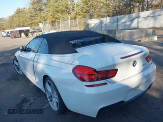 2012 BMW 6 Series 650i with VIN WBALZ3C51CDL73084, listed as a IAAI auction lot 41656473 with 61,152 mi miles and . Bid and sale history available at carsss.com. Image 3.