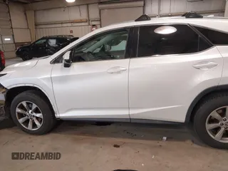 2018 Lexus RX 350 z VIN 2T2BZMCA5JC144530, wystawiony jako IAAI lot #41417396 z przebiegiem 97 860 mil mil oraz . Historia ofert i sprzedaży dostępna na DreamBid. Obrazek 14.