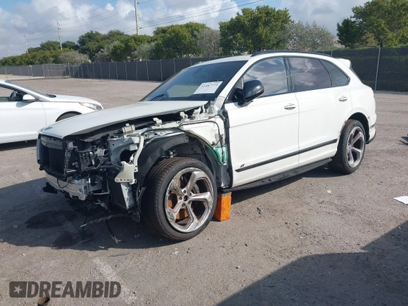 2022 Bentley Bentayga V8 z VIN SJAAM2ZV2NC013035, wystawiony jako IAAI lot #41487773 z przebiegiem 35 500 mil mil oraz . Historia ofert i sprzedaży dostępna na DreamBid. Obrazek 17.