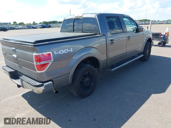 2011 Ford F-150 XLT with VIN 1FTFW1ET5BFB32561, listed as a IAAI auction lot 42684164 with 239,869 mi miles and . Bid and sale history available at DreamBid. Image 4.