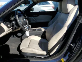 2011 BMW Z4 sDrive30i with VIN WBALM5C57BE162491, listed as a Copart auction lot 47995105 with 97,976 mi miles and Salvage Title. Bid and sale history available at carsss.com. Image 7.