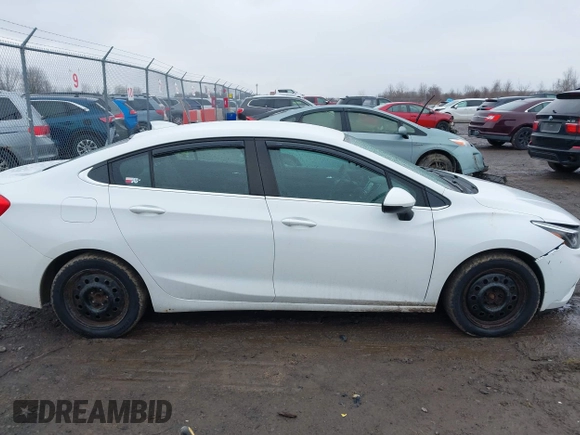 2017 Chevrolet Cruze LT with VIN 1G1BE5SM0H7100327, listed as a IAAI auction lot 42012403 with 122,493 mi miles and . Bid and sale history available at DreamBid. Image 13.