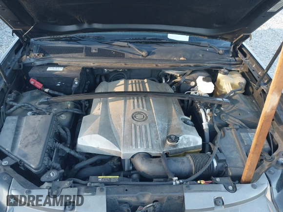 2004 Cadillac SRX with VIN 1GYDE63A040116714, listed as a IAAI auction lot 41828311 with 128,372 mi miles. Bid and sale history available at carsss.com. Image 10.
