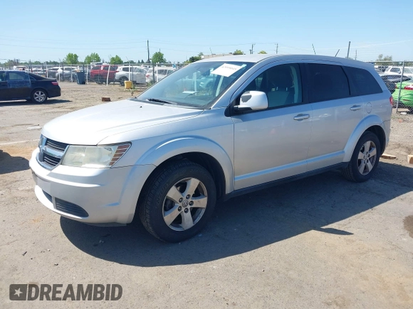 2009 Dodge Journey SXT with VIN 3D4GG57V19T211770, listed as a IAAI auction lot 42095045 with 164,610 mi miles. Bid and sale history available at carsss.com. Image 2.