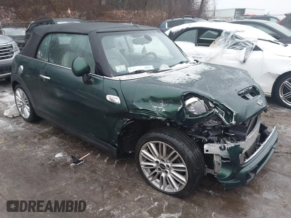 2017 MINI Convertible Cooper S z VIN WMWWG9C38H3C81071, wystawiony jako IAAI lot #41522738 z przebiegiem 59 040 mil mil oraz . Historia ofert i sprzedaży dostępna na DreamBid. Obrazek 1.