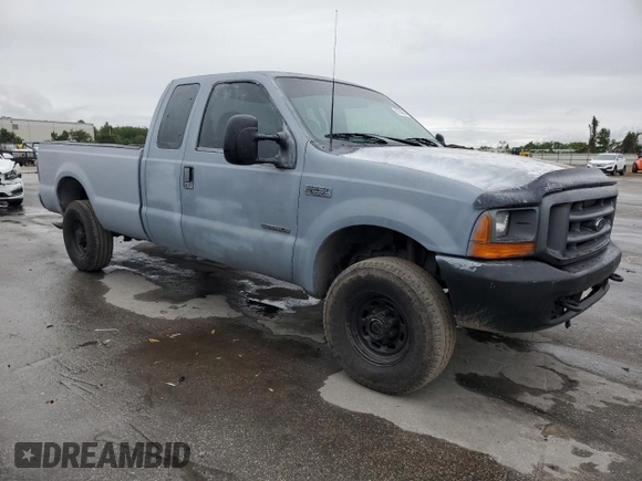 2000 Ford F-250 XL with VIN 1FTNX21F3YED35736, listed as a Copart auction lot 50309805 with 303,811 mi miles and Salvage title. Bid and sale history available at DreamBid. Image 4.