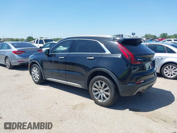 2019 Cadillac XT4 FWD Premium Luxury z VIN 1GYFZCR48KF141478, wystawiony jako IAAI lot #41988092 z przebiegiem 53 970 mil mil oraz . Historia ofert i sprzedaży dostępna na DreamBid. Obrazek 3.