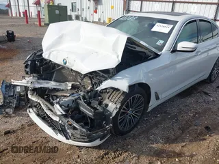 2018 BMW 5 Series 530i with VIN WBAJA5C5XJWA56855, listed as a IAAI auction lot 41128814 with Not Provided miles and . Bid and sale history available at DreamBid. Image 21.
