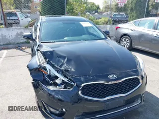 2015 Kia Cadenza Premium with VIN KNALN4D71F5173211, listed as a IAAI auction lot 42039170 with 128,625 mi miles. Bid and sale history available at carsss.com. Image 1.