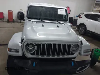 2024 Jeep Wrangler Sahara with VIN 1C4RJXP63RW202929, listed as a IAAI auction lot 41002346 with 12,332 mi miles and . Bid and sale history available at DreamBid. Image 13.