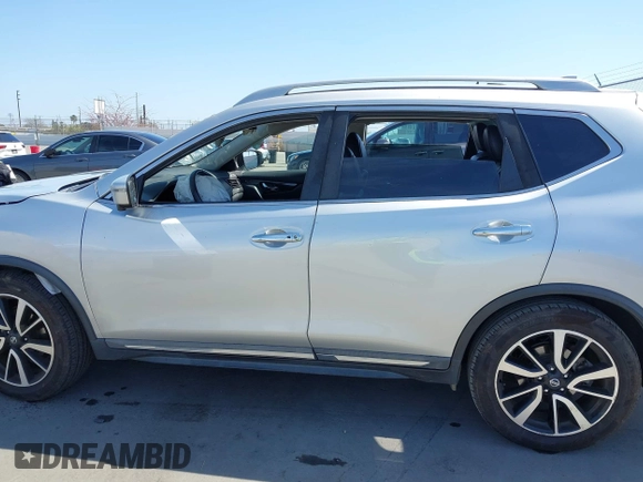 2019 Nissan Rogue SV with VIN 5N1AT2MT1KC788635, listed as a IAAI auction lot 42094964 with 50,431 mi miles and . Bid and sale history available at DreamBid. Image 14.