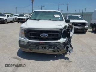 2022 Ford F-150 XL with VIN 1FTFW1E57NKE11717, listed as a IAAI auction lot 42115356 with 50,315 mi miles and . Bid and sale history available at carsss.com. Image 12.