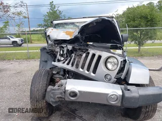 2016 Jeep Wrangler Unlimited Sahara with VIN 1C4BJWEG3GL240859, listed as a IAAI auction lot 42628937 with 103,378 mi miles and . Bid and sale history available at DreamBid. Image 12.