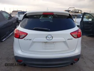 2014 Mazda CX-5 Touring with VIN JM3KE2CY8E0321578, listed as a IAAI auction lot 41769930 with 101,724 mi miles. Bid and sale history available at carsss.com. Image 16.