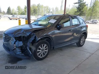 2016 Mazda CX-5 Sport with VIN JM3KE4BY1G0910102, listed as a IAAI auction lot 42115163 with 144,495 mi miles and . Bid and sale history available at carsss.com. Image 18.