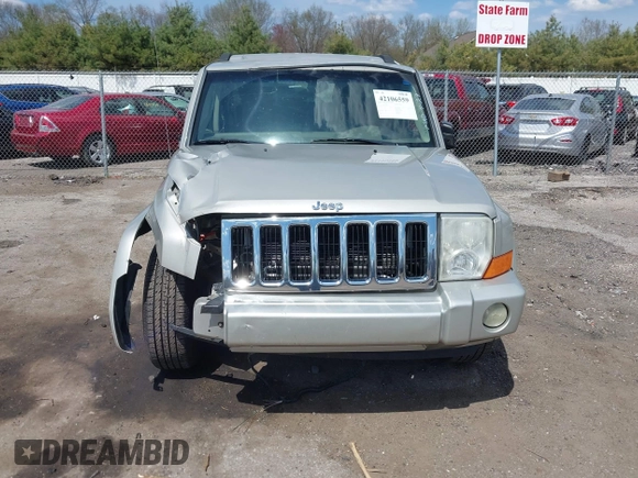 2007 Jeep Commander Sport z VIN 1J8HG48P17C695954, wystawiony jako IAAI lot #42106559 z przebiegiem Nie podano mil oraz . Historia ofert i sprzedaży dostępna na DreamBid. Obrazek 13.
