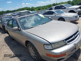 1998 Nissan Maxima GXE z VIN JN1CA21D7WT519368, wystawiony jako IAAI lot #42191950 z przebiegiem 248 279 mil mil oraz . Historia ofert i sprzedaży dostępna na DreamBid. Obrazek 1.