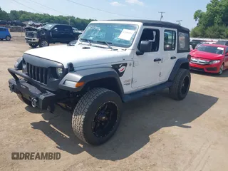 2018 Jeep Wrangler Unlimited Sport S with VIN 1C4HJXDG7JW150038, listed as a IAAI auction lot 42519194 with 113,300 mi miles and . Bid and sale history available at DreamBid. Image 17.
