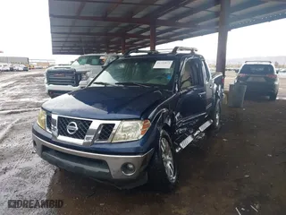 2011 Nissan Frontier PRO-4X with VIN 1N6AD0EV7BC426151, listed as a IAAI auction lot 41751873 with 152,464 mi miles. Bid and sale history available at carsss.com. Image 2.