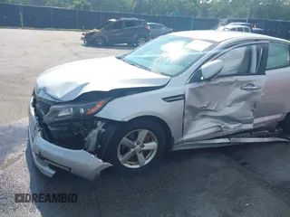 2015 Kia Optima LX with VIN 5XXGM4A75FG378795, listed as a IAAI auction lot 42604014 with 57,199 mi miles and . Bid and sale history available at DreamBid. Image 6.